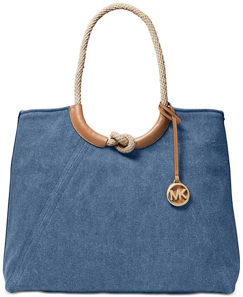 michael michael kors isla ring shoulder tote|Isla Large Canvas Tote Bag .